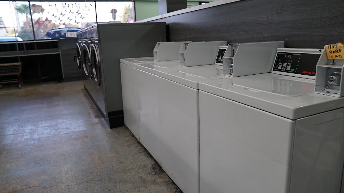 Row of top-loading washers